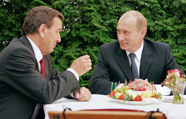 Gerhard Schroeder (left), Vladimir Putin ITAR-TASS Archive/Vladimir Rodionov