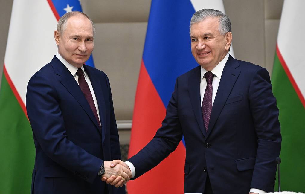 Russian President Vladimir Putin and Uzbek President Shavkat Mirziyoyev Sergey Bobylev/POOL/TASS