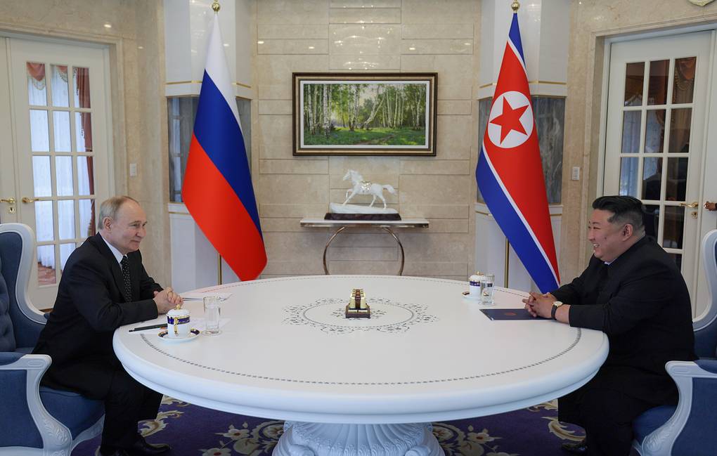 Russian President Vladimir Putin and North Korean Leader Kim Jong Un Gavriil Grigorov/Russian Presidential Press and Information Office/TASS